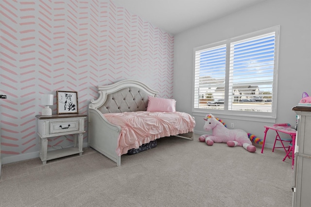 bedroom with light colored carpet