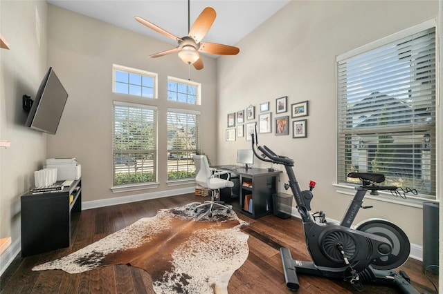 916 Morning Moon Cir, Austin, TX 78732 - office with ceiling fan, a high ceiling, and dark wood-style flooring