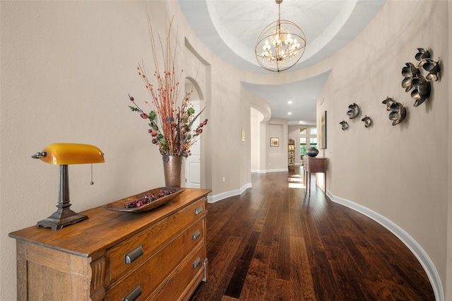 916 Morning Moon Cir, Austin, TX 78732 - hallway with a chandelier and dark wood-style flooring