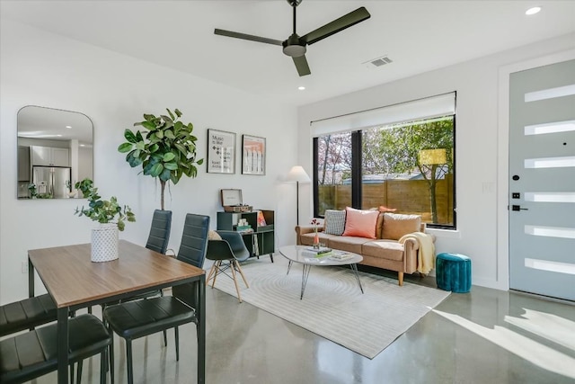 612 Irma Dr Unit 2, Austin, TX 78752 - living room with finished concrete floors, a ceiling fan, and recessed lighting