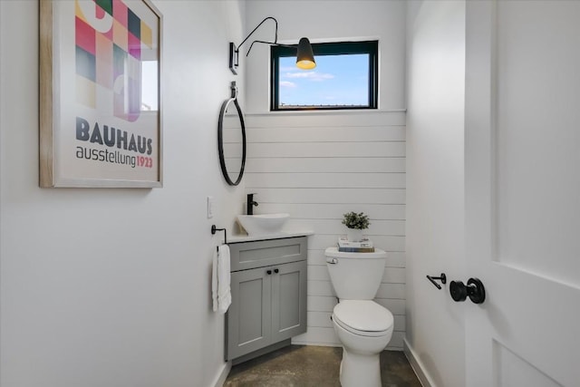612 Irma Dr Unit 2, Austin, TX 78752 - bathroom with toilet, vanity, and baseboards