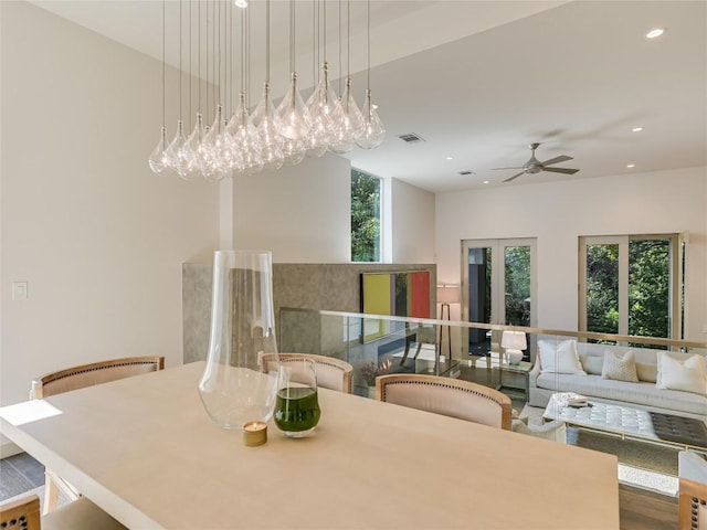 dining space with ceiling fan, visible vents, wood finished floors, and recessed lighting