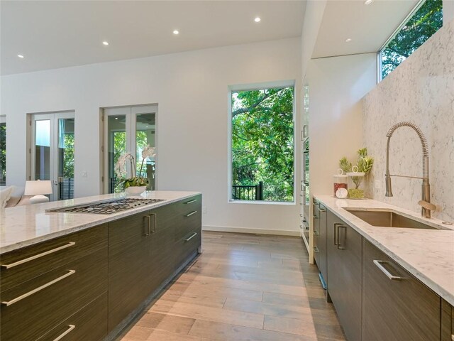 kitchen featuring sink and plenty of natural light