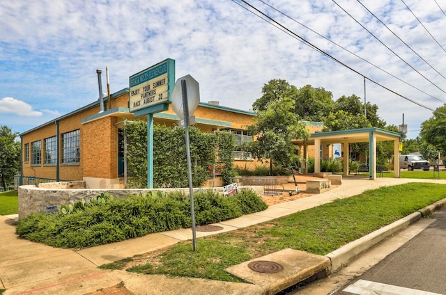 surrounding community with a carport