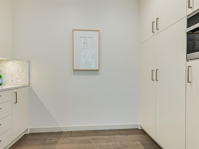 spacious closet with wood finished floors