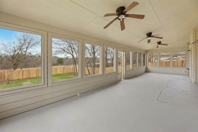 unfurnished sunroom with a healthy amount of sunlight