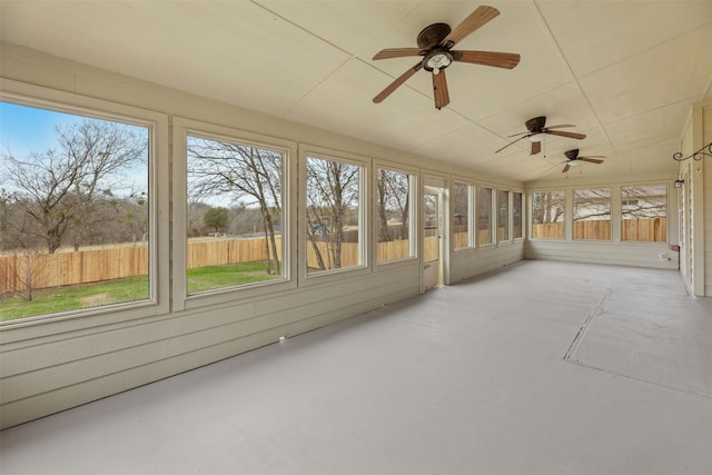 12206 Athens St, Manor, TX 78653 - unfurnished sunroom featuring healthy amount of natural light and ceiling fan