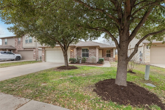 view of front facade featuring a garage and a front lawn