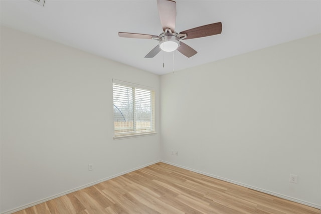 unfurnished room with ceiling fan and light hardwood / wood-style floors