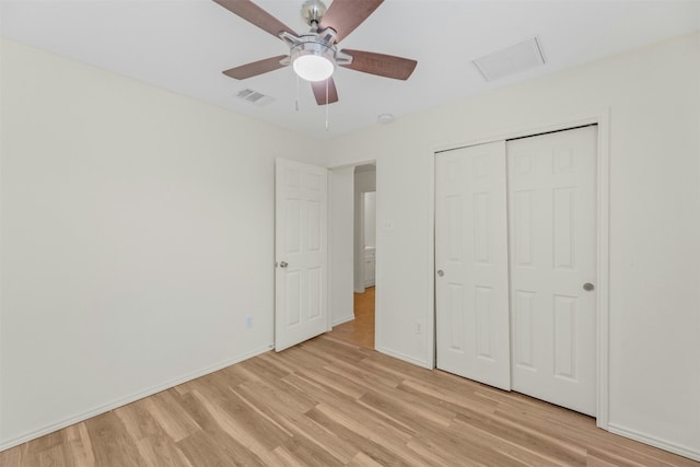 12206 Athens St, Manor, TX 78653 - unfurnished bedroom with light wood-style flooring, baseboards, a closet, and ceiling fan