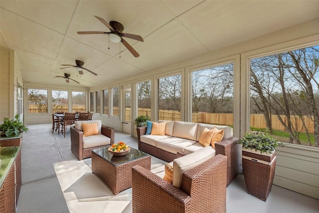 12206 Athens St, Manor, TX 78653 - sunroom featuring a ceiling fan, an outdoor living space, and outdoor dining space