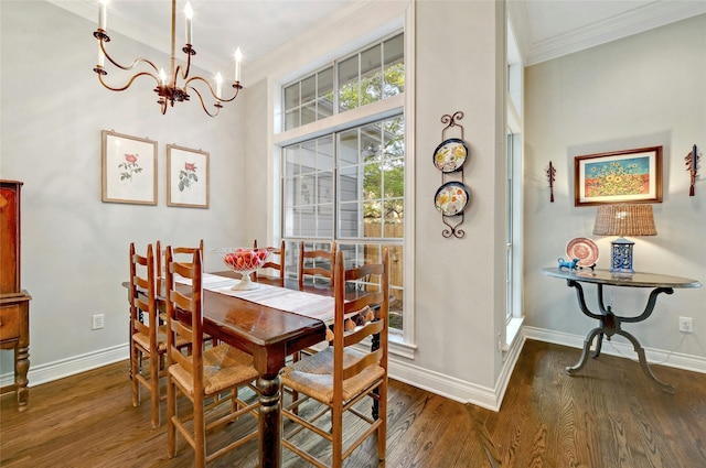 dining room featuring crown molding, a notable chandelier, and dark hardwood / wood-style flooring