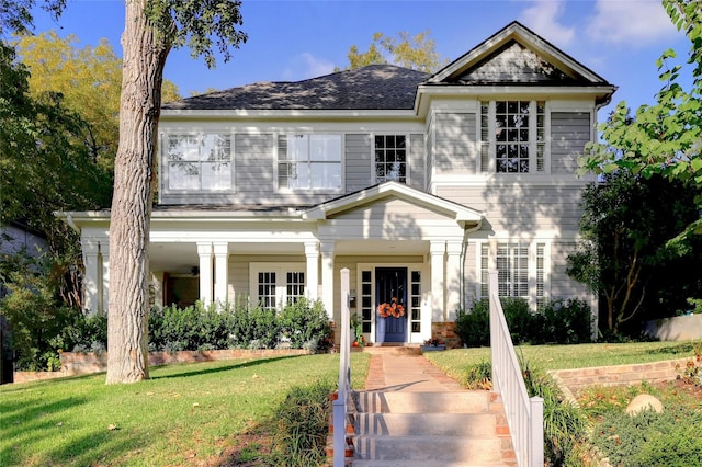 view of front of property featuring a front yard