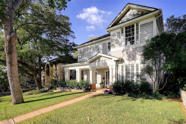 view of front of property with a front lawn