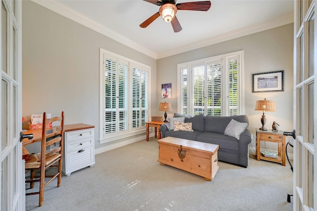 carpeted living room featuring crown molding, ceiling fan, and french doors