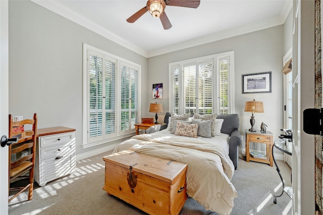 bedroom featuring light colored carpet, ceiling fan, and ornamental molding