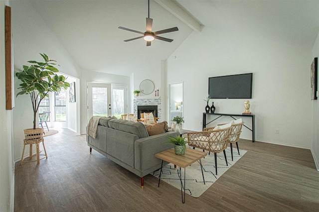 living room with ceiling fan, beamed ceiling, dark wood-type flooring, and high vaulted ceiling