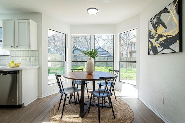 106 N Mockingbird Cir, Cedar Creek, TX 78612 - dining space with plenty of natural light and dark wood-type flooring