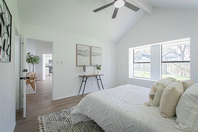 106 N Mockingbird Cir, Cedar Creek, TX 78612 - bedroom with beamed ceiling, wood finished floors, ceiling fan, and high vaulted ceiling