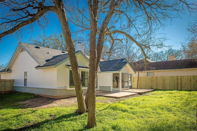 106 N Mockingbird Cir, Cedar Creek, TX 78612 - back of property featuring a patio area, a chimney, and a shingled roof