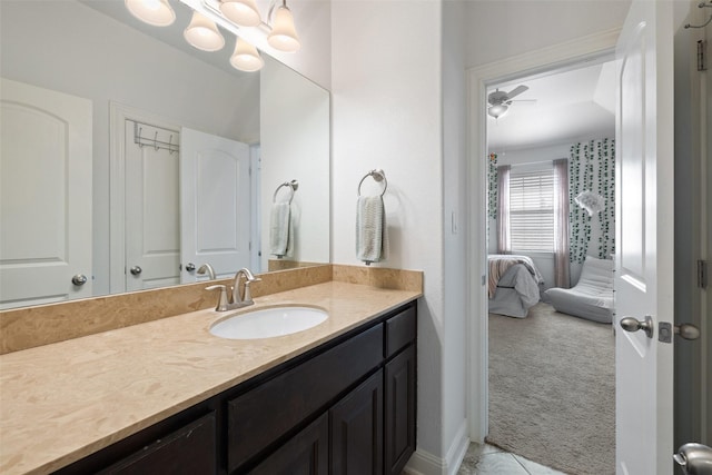 bathroom featuring ceiling fan and vanity