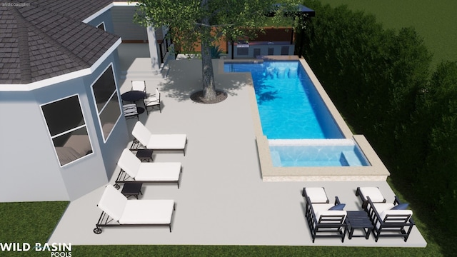 view of swimming pool featuring a patio and an in ground hot tub