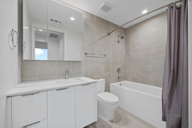 full bathroom featuring toilet, tile walls, vanity, shower / bathtub combination with curtain, and backsplash