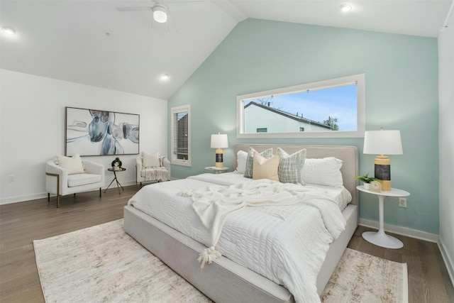 bedroom featuring ceiling fan, wood-type flooring, and lofted ceiling