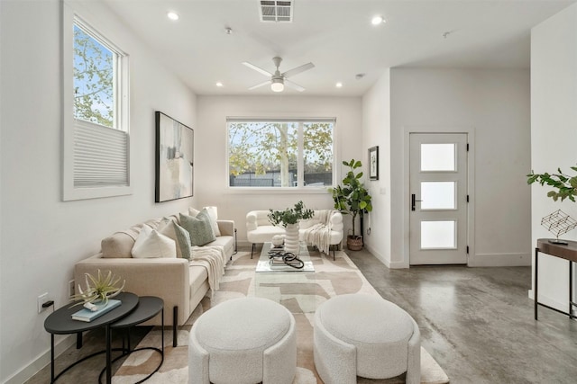 living room featuring ceiling fan