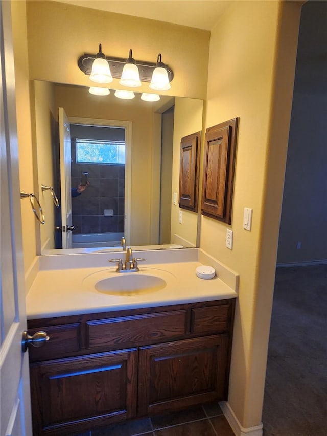 bathroom with tile patterned floors and vanity