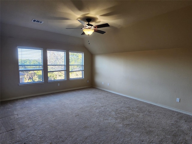 additional living space featuring ceiling fan, carpet flooring, and vaulted ceiling