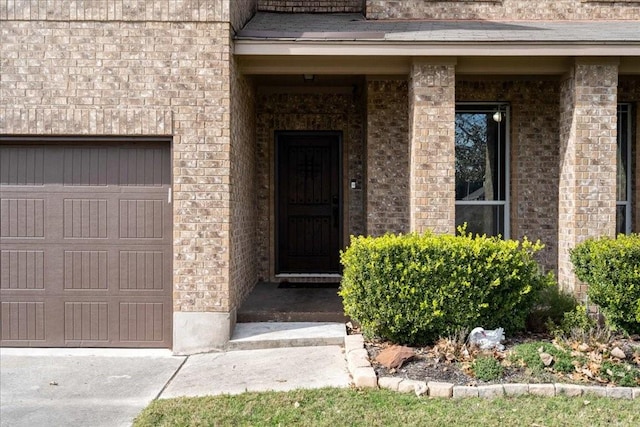 property entrance featuring a garage