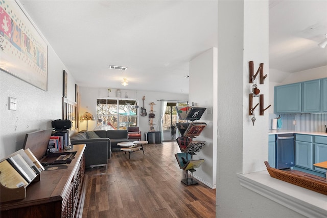 living room featuring dark hardwood / wood-style flooring