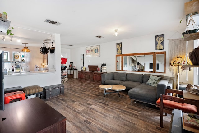 living room with dark wood-type flooring