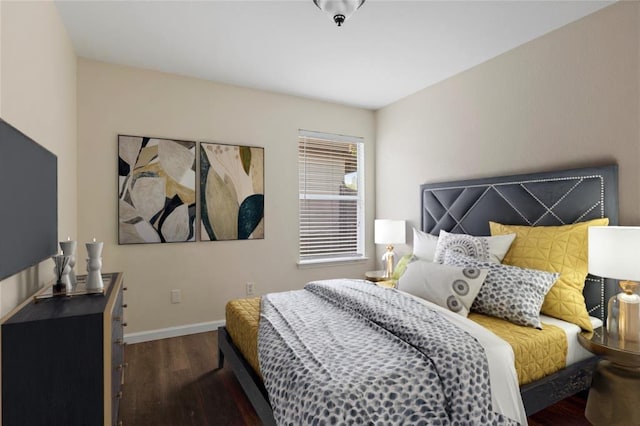 bedroom featuring dark hardwood / wood-style floors