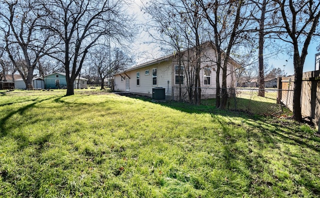 view of yard featuring central AC