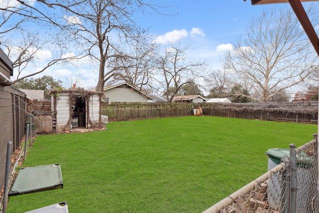 view of yard with a storage unit