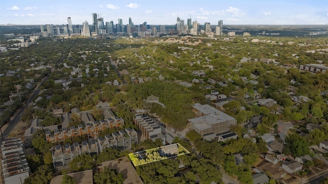 birds eye view of property featuring a view of city