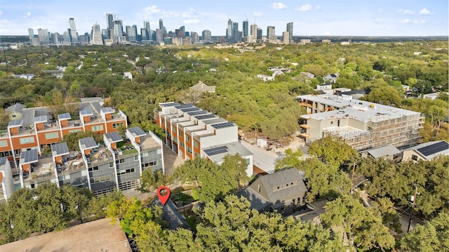 birds eye view of property featuring a view of city