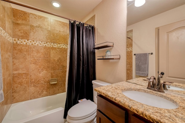 full bathroom featuring toilet, vanity, and shower / tub combo with curtain