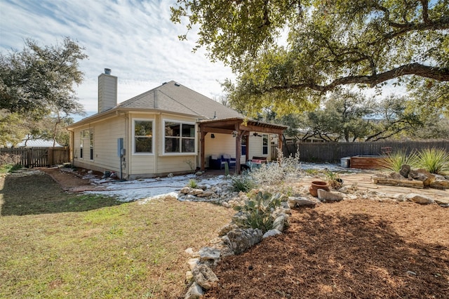 exterior space featuring a patio area and a lawn