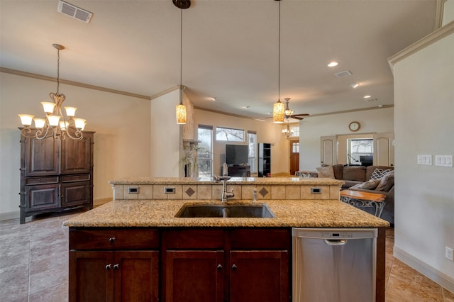 kitchen featuring sink, dishwasher, hanging light fixtures, and a kitchen island with sink