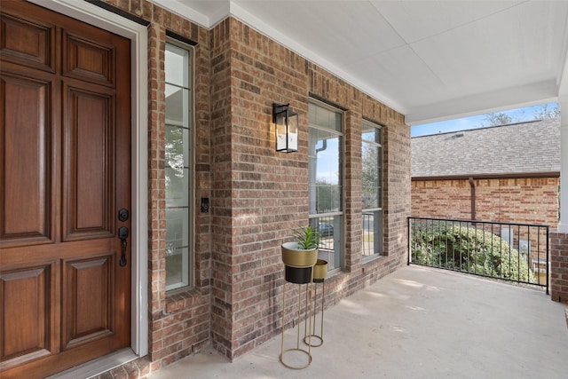 entrance to property with covered porch