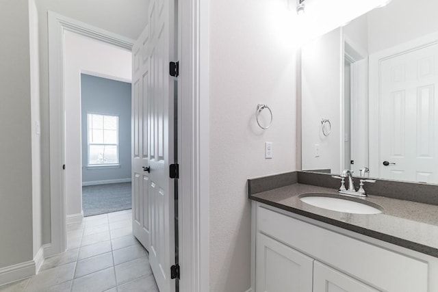 bathroom featuring vanity and tile patterned flooring