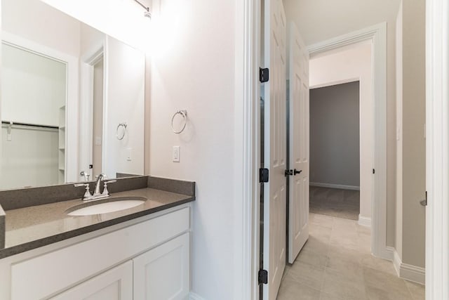 17604 Arend Path, Pflugerville, TX 78660 - bathroom with vanity and baseboards