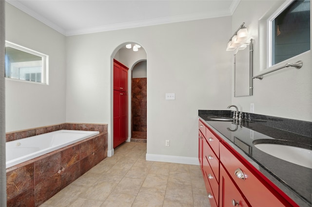 bathroom with a relaxing tiled tub, vanity, and ornamental molding