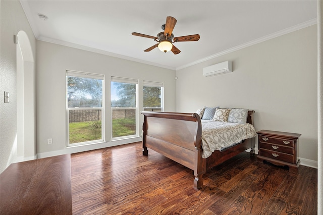 bedroom featuring dark hardwood / wood-style flooring, crown molding, a wall mounted AC, and ceiling fan