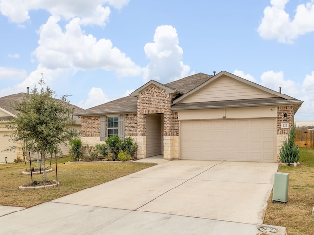 ranch-style home with a front yard and a garage