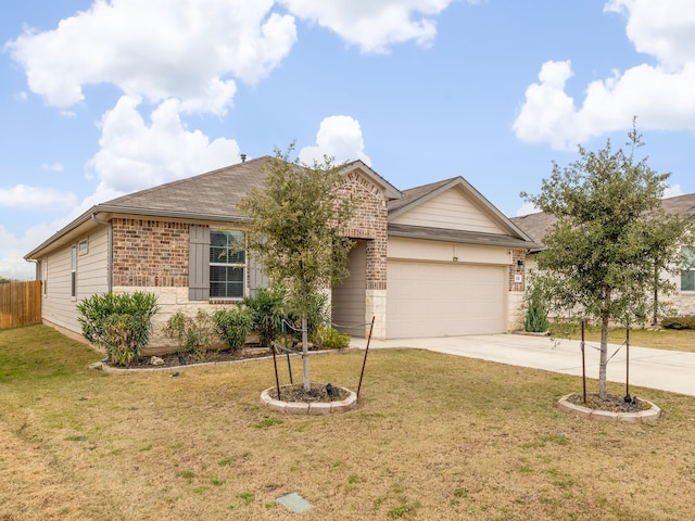 ranch-style home with a garage and a front yard