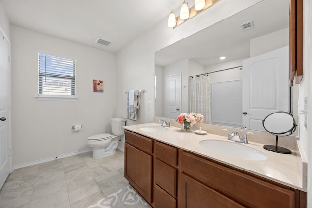 17106 Gibbons Path, Round Rock, TX 78664 - bathroom featuring baseboards, double vanity, toilet, and a shower with shower curtain